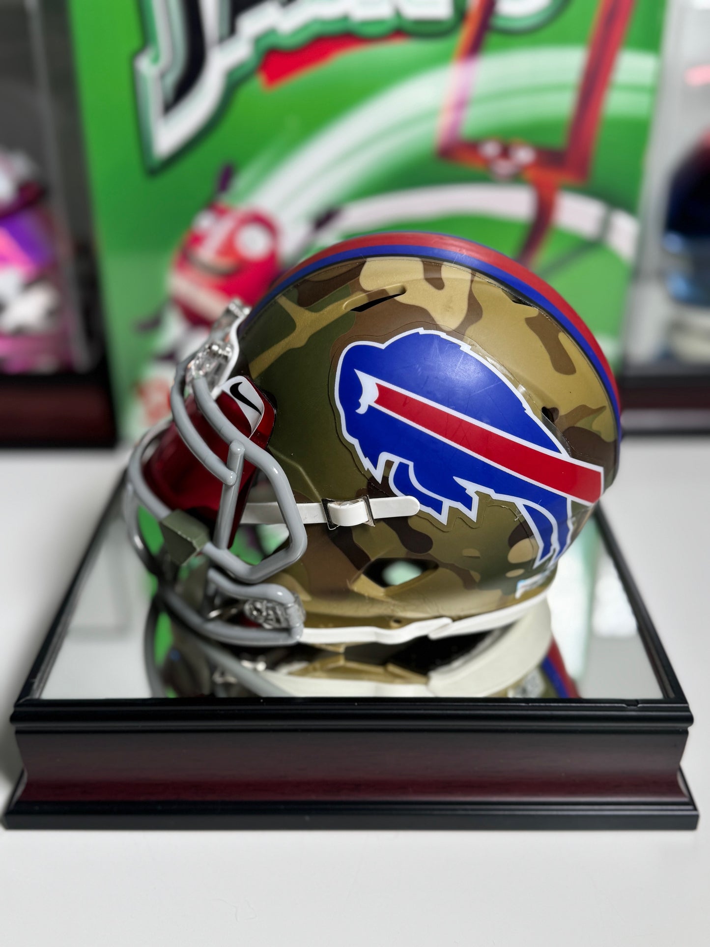 Beckett COA included with Jim Kelly Salute to Service camo mini helmet collectible