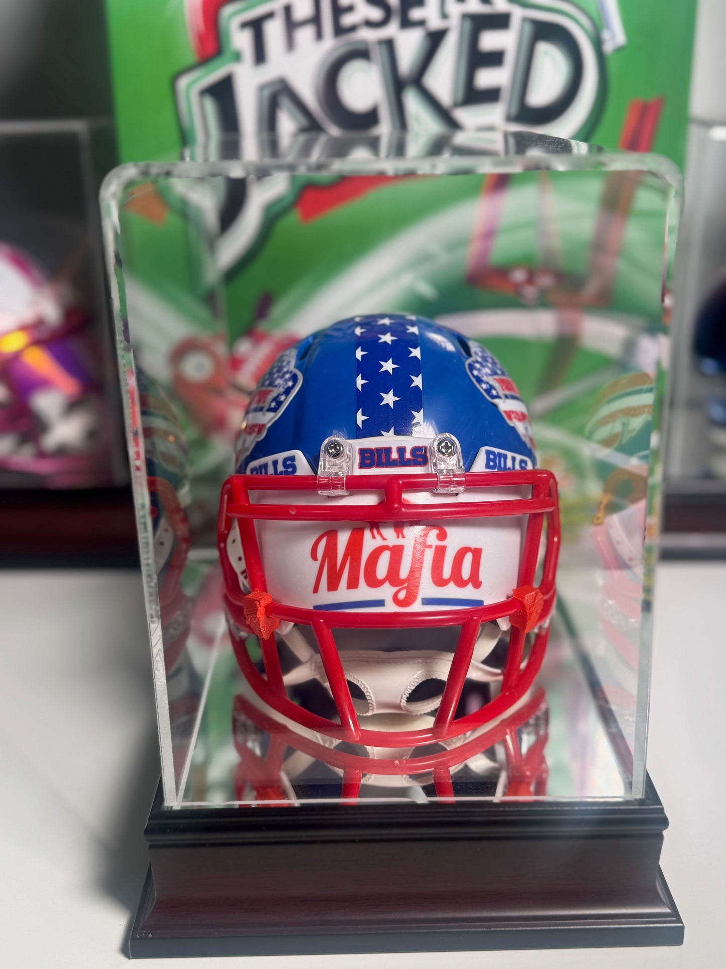 Fanatics display case housing Devin Singletary autographed USA-themed mini helmet