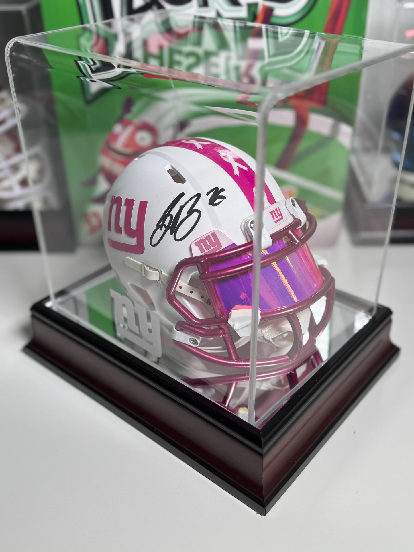 Saquon Barkley signature on pink NFL mini helmet