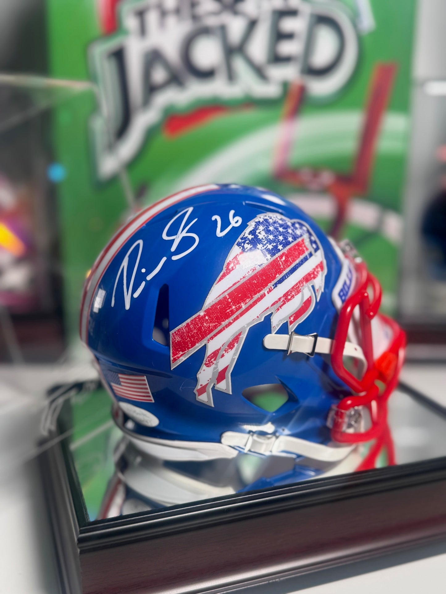 Side of custom Bills Mafia mini helmet signed by Devin Singletary with patriotic visor