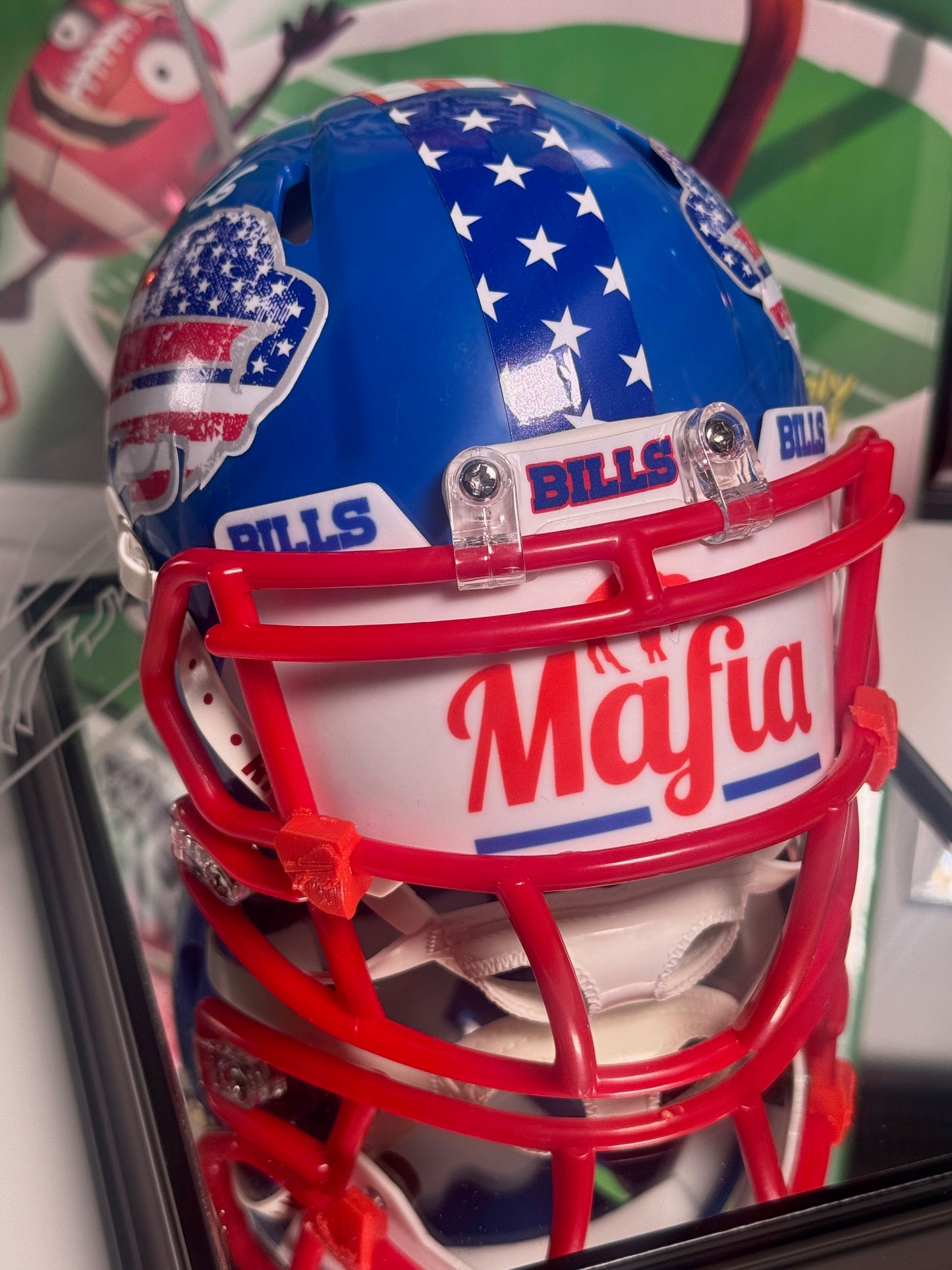 Side view of custom Bills Mafia mini helmet signed by Devin Singletary with patriotic visor