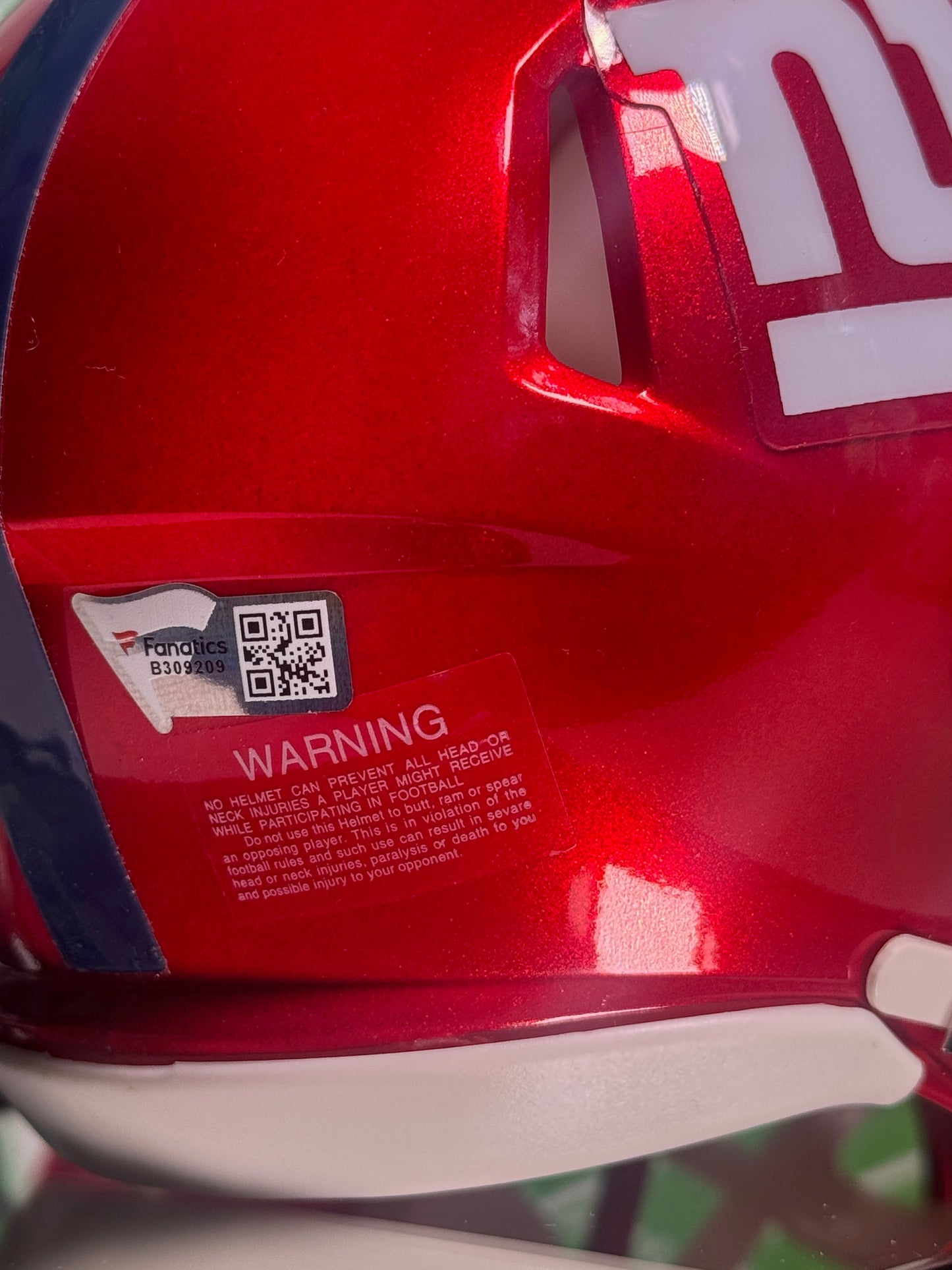 Back angle showing blue stripe detail on red Flash New York Giants mini helmet
