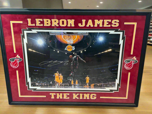 LeBron’s Heat hold off Kobe’s Lakers
