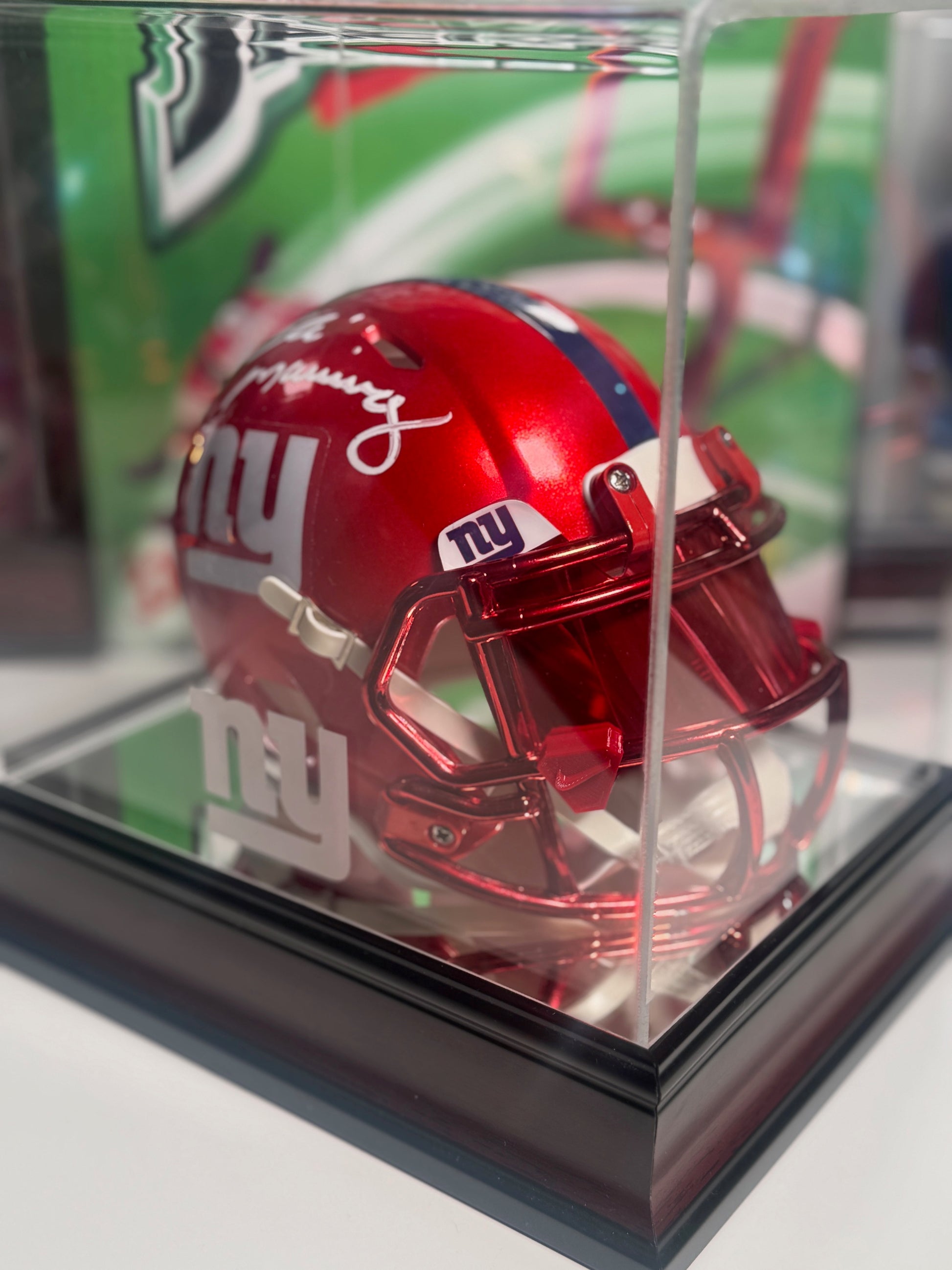 Preowned Fanatics mini helmet case with minor scratches visible on close inspection